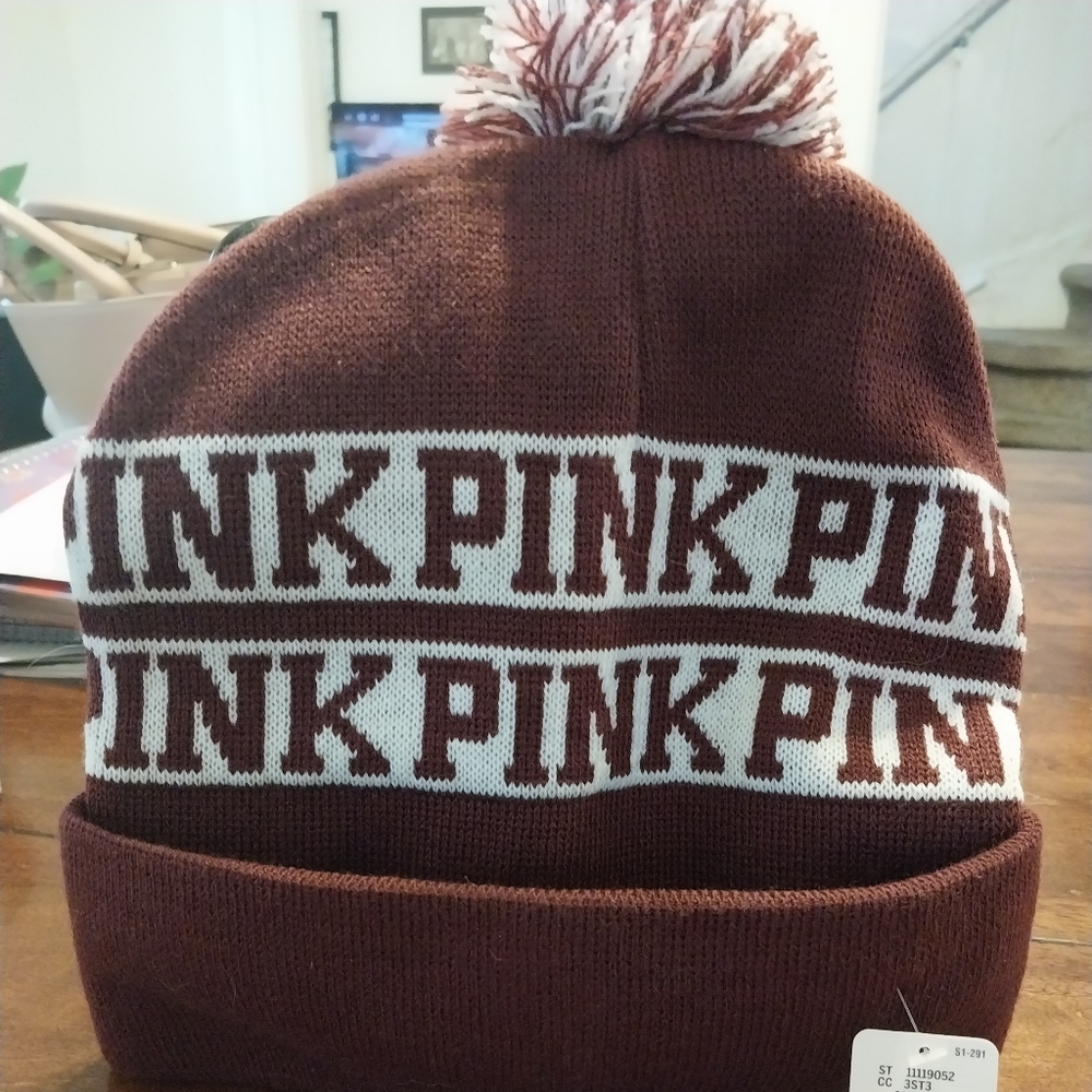 Nwt Pink hat with ponpon